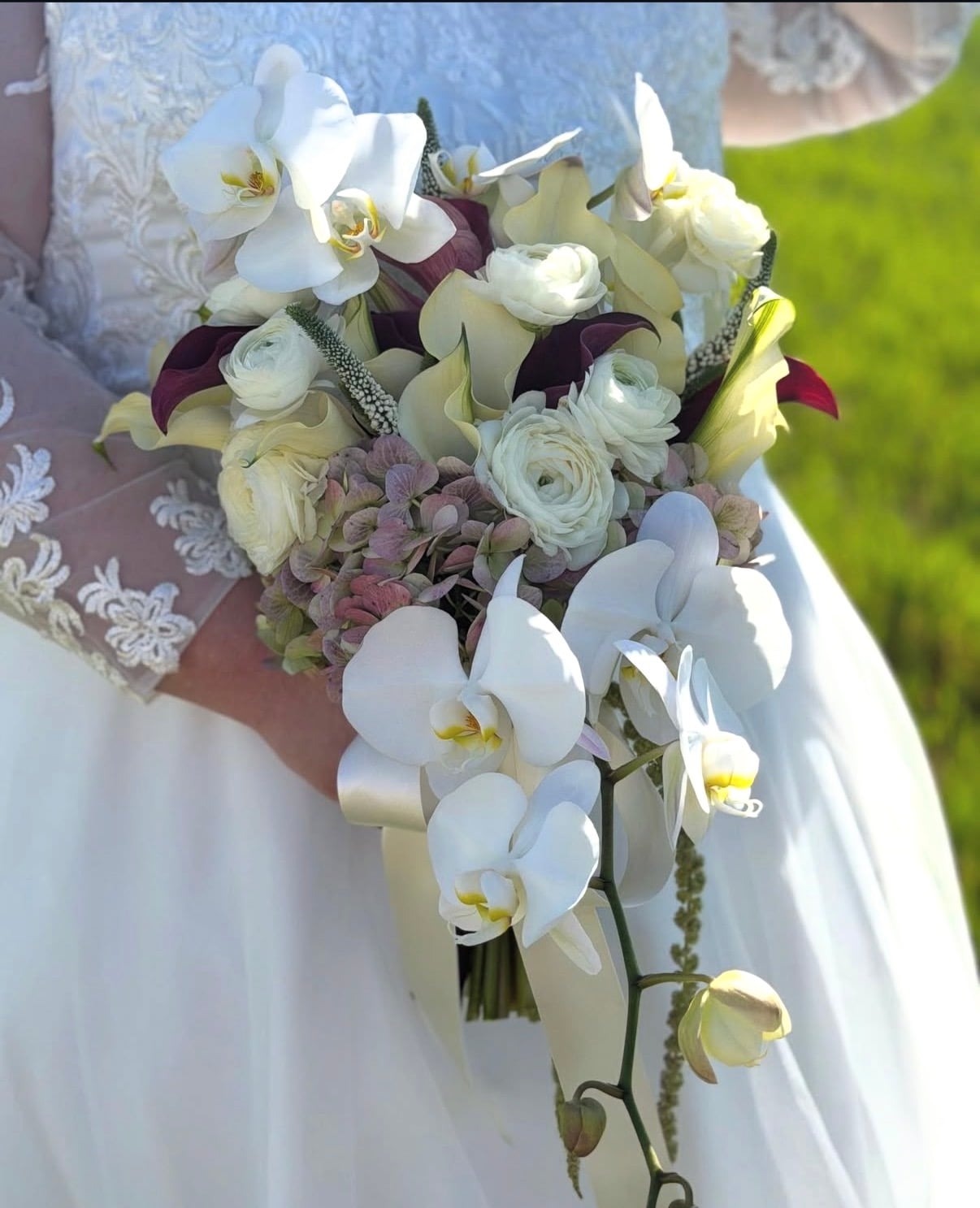 Cascading orchid bridal bouquet